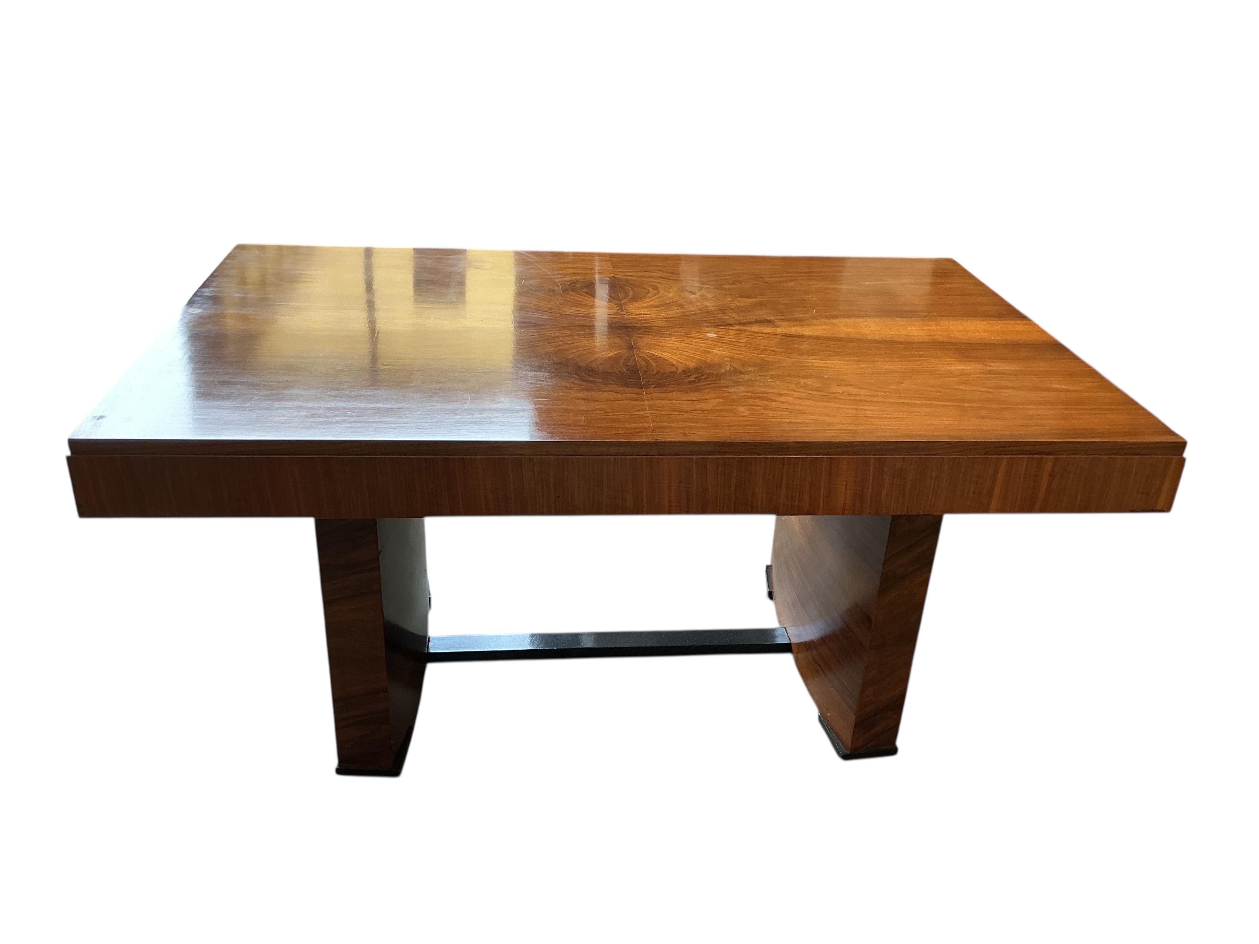 An Art Deco style rectangular walnut dining table, width 254cm extended, two spare leaves, depth 98cm, height 77cm together with six Empire style cherry dining chairs